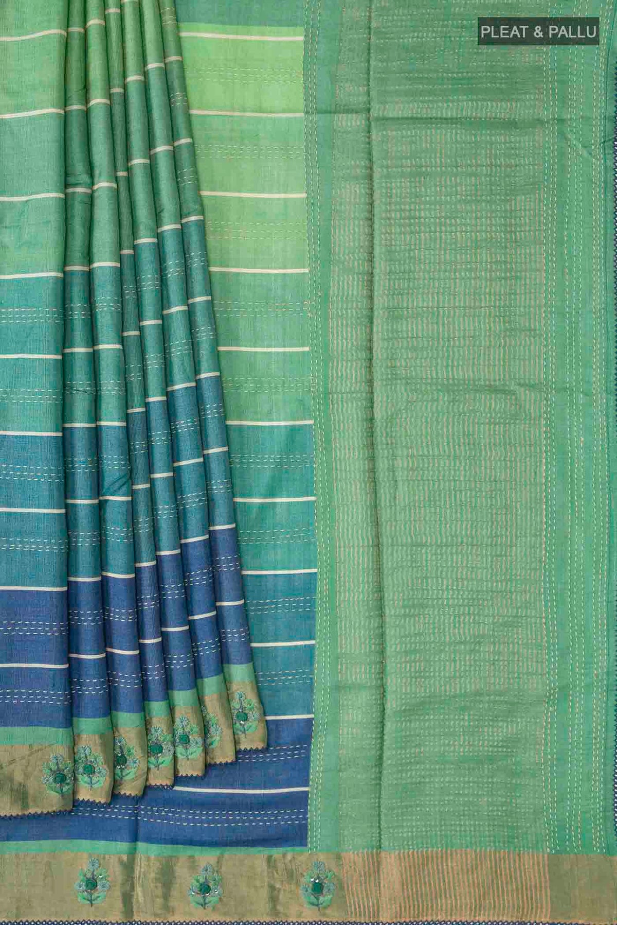Pleats and pallu of Green Tussar Silk Saree with Embroidery on the body and Zari Border