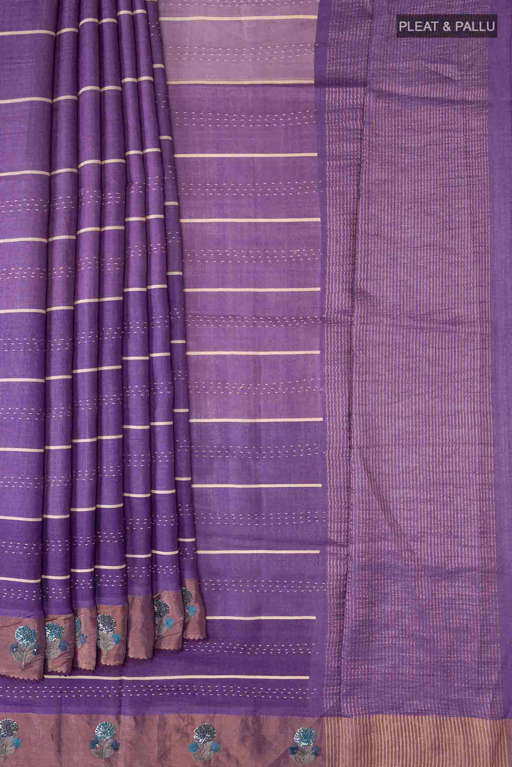 Pleats and pallu of Lavender Tussar Silk Saree with Embroidery on the body and Zari Border