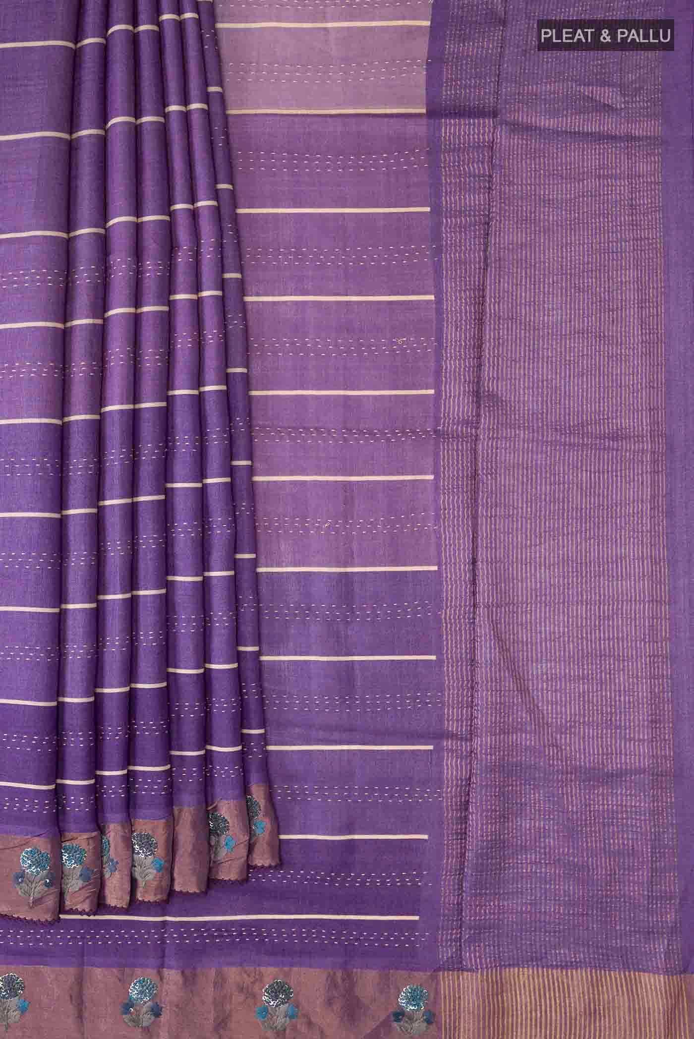 Pleats and pallu of Lavender Tussar Silk Saree with Embroidery on the body and Zari Border