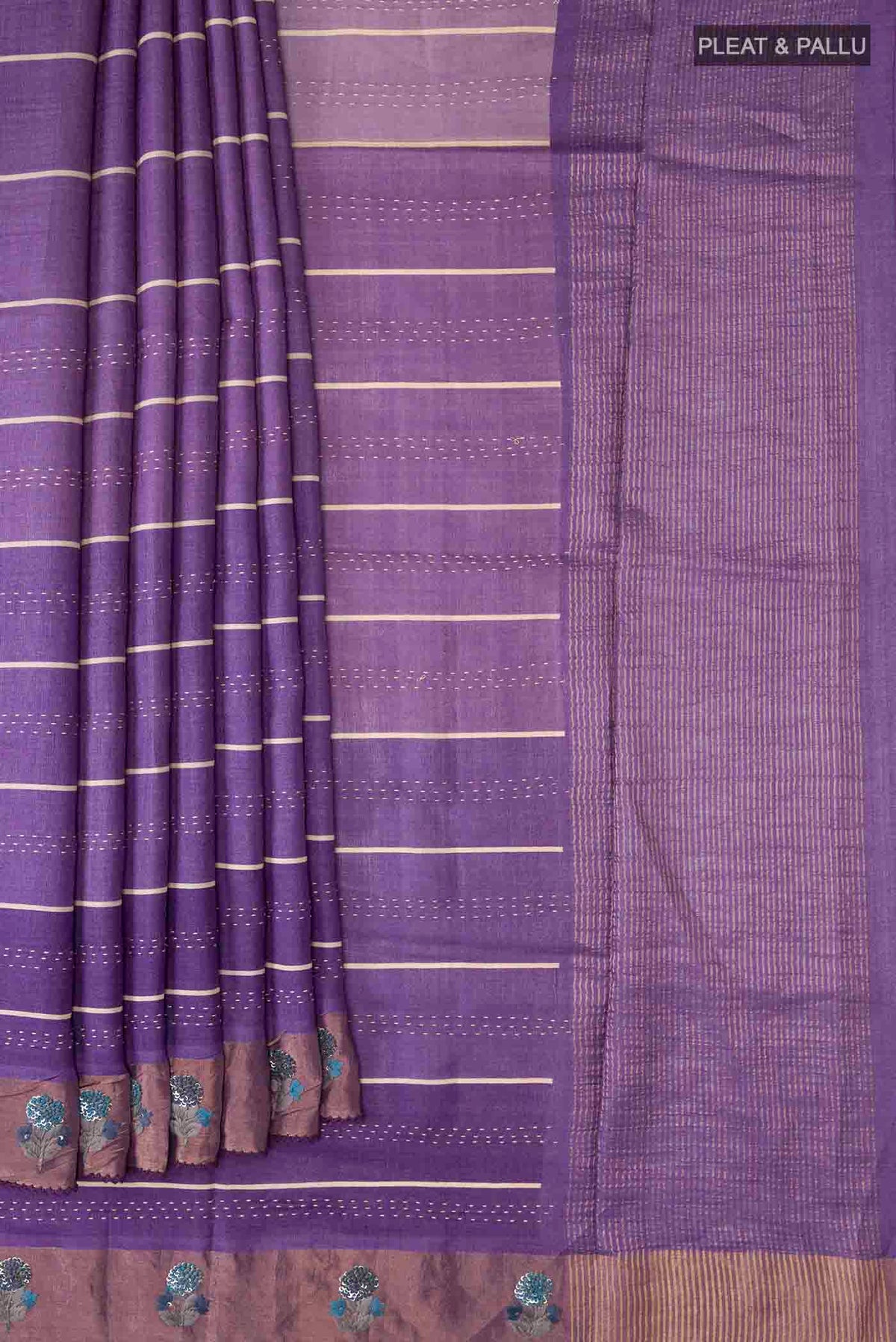 Pleats and pallu of Lavender Tussar Silk Saree with Embroidery on the body and Zari Border
