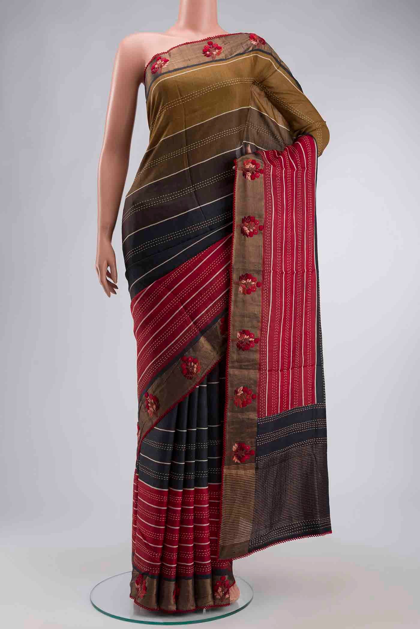 Multi Color Tussar Silk Saree with Embroidery on the body and Embroidery Border displayed on a mannequin