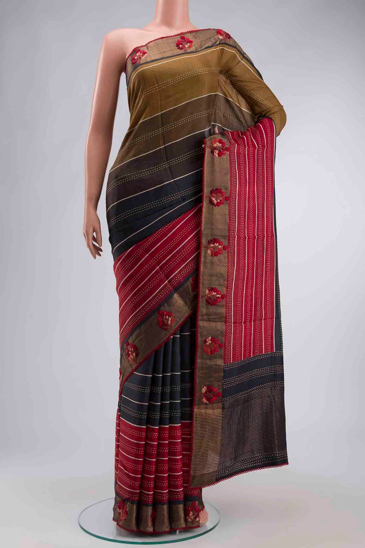 Multi Color Tussar Silk Saree with Embroidery on the body and Embroidery Border displayed on a mannequin
