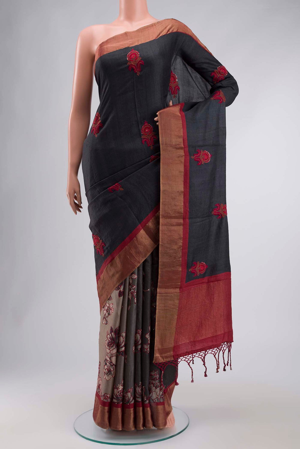 Blue Tussar Silk Saree with Embroidery on the body and Zari Border displayed on a mannequin