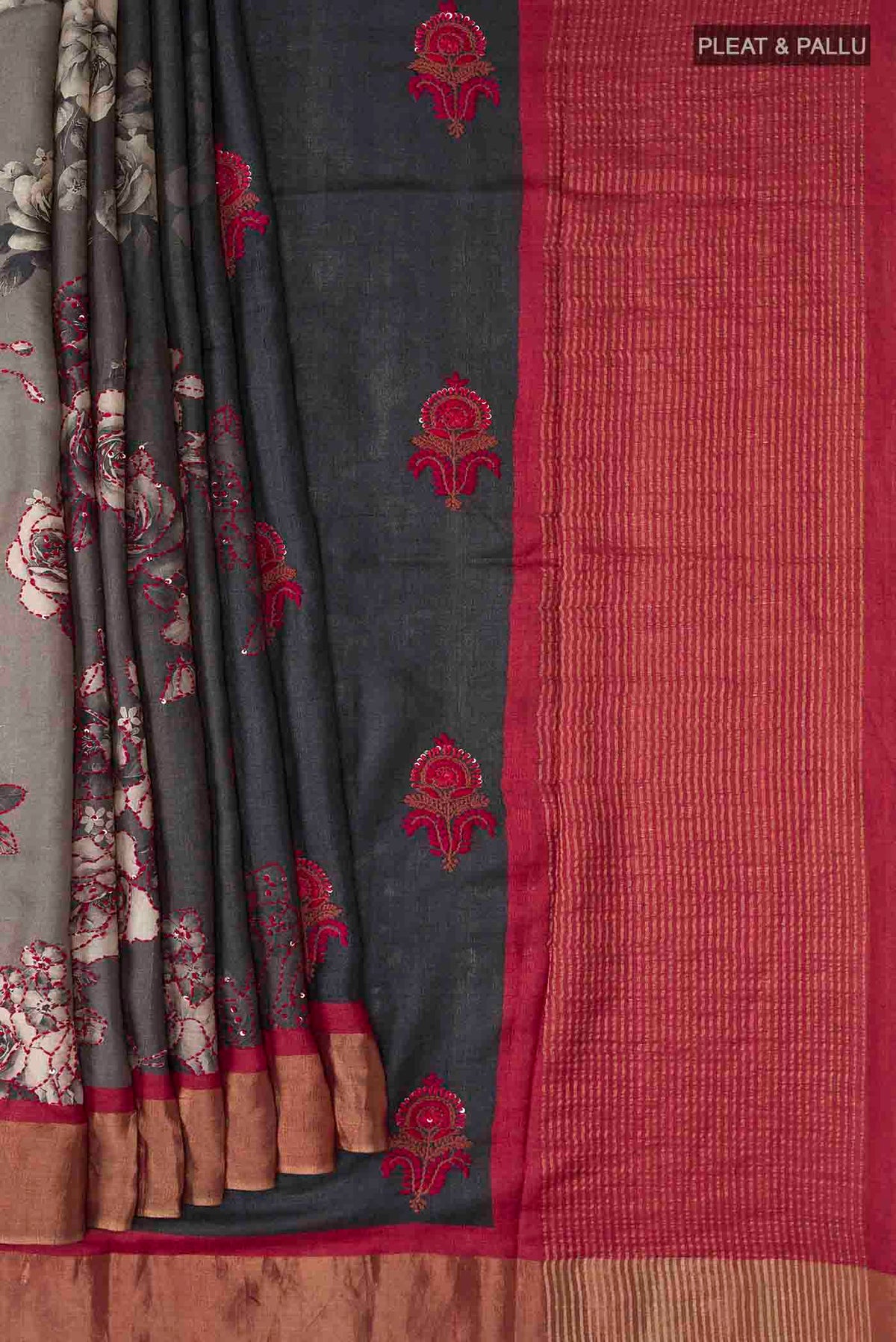 Pleats and pallu of Blue Tussar Silk Saree with Embroidery on the body and Zari Border
