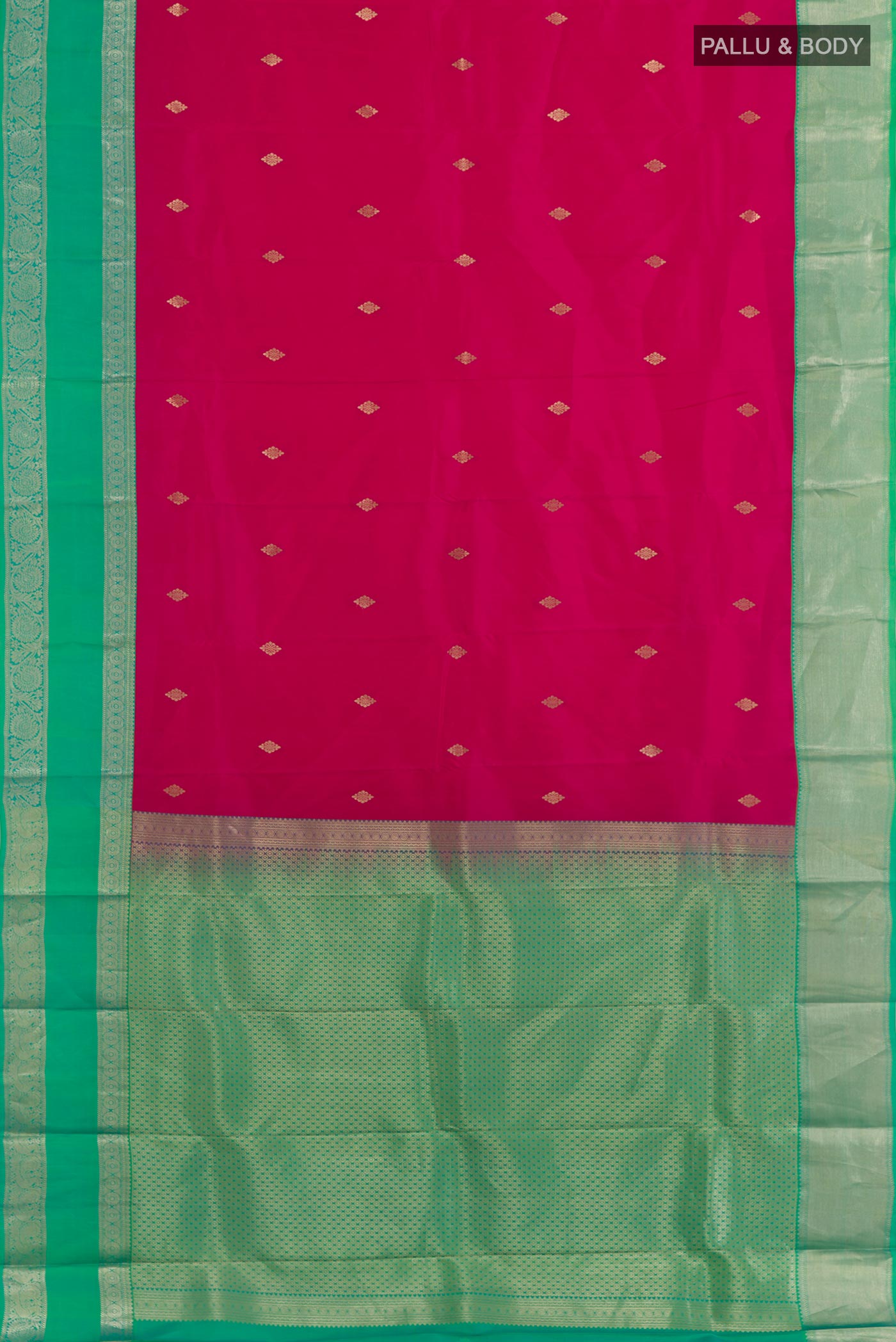 Flat view of Pink Kanjivaram Silk Saree with Zari Butta on the body and Zari Border. 