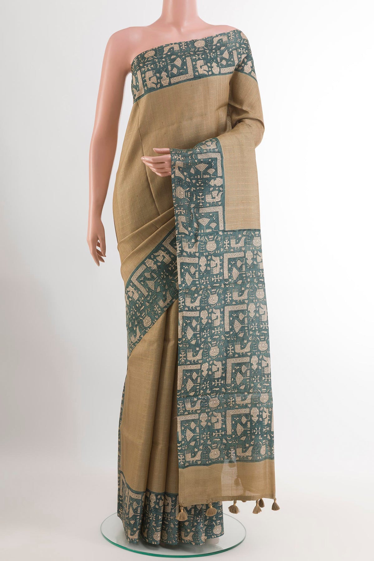 Beige Tussar Saree with Checked design on the body and Zari Border.  displayed on a mannequin