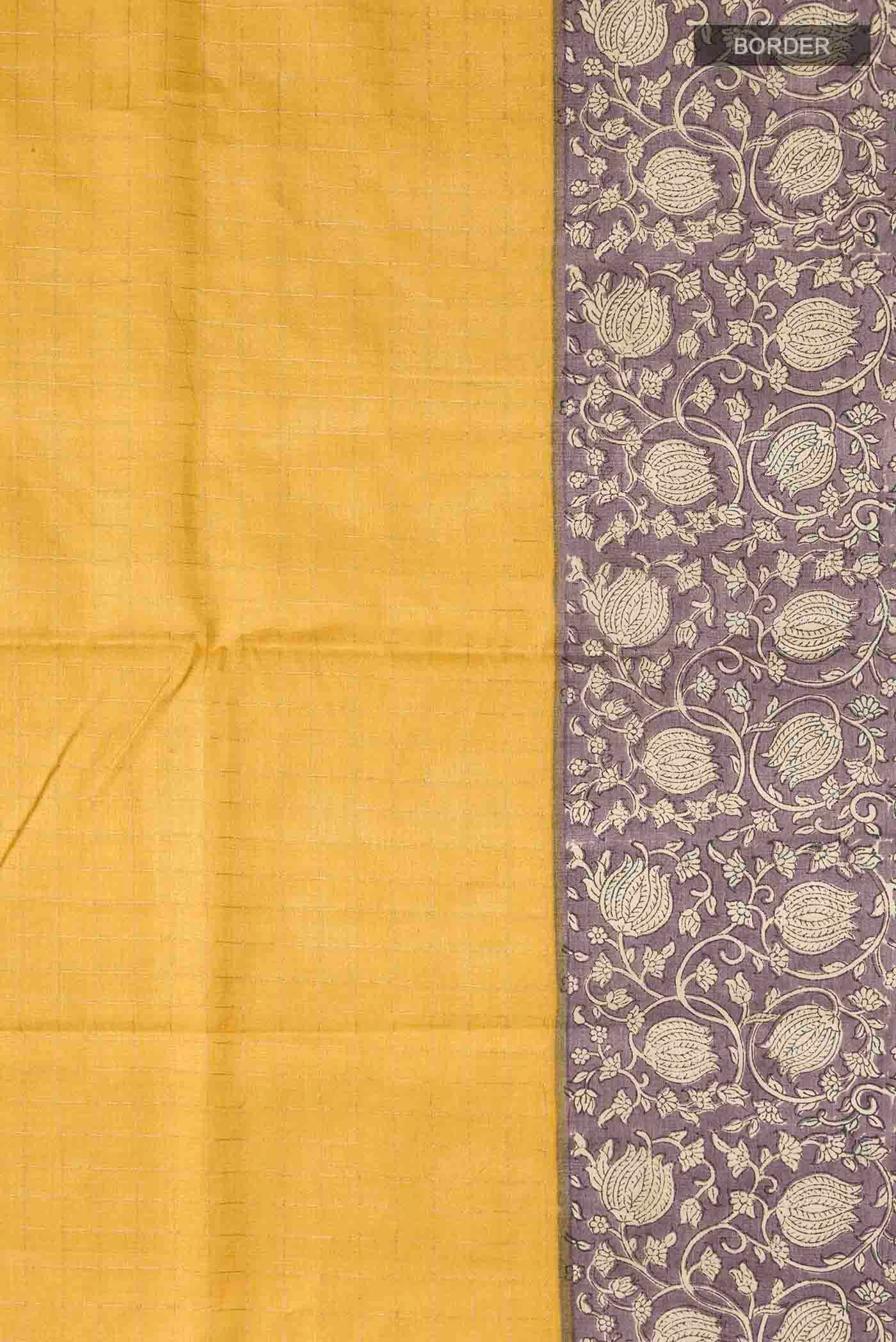 Border image of Yellow Tussar Silk Saree with Checked design on the body and Printed Border