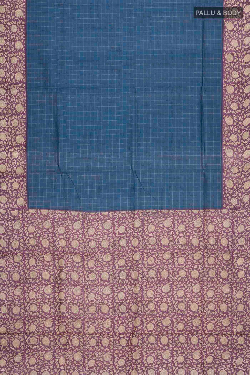 Flat view of Blue Tussar Silk Saree with Checked design on the body and Printed Border