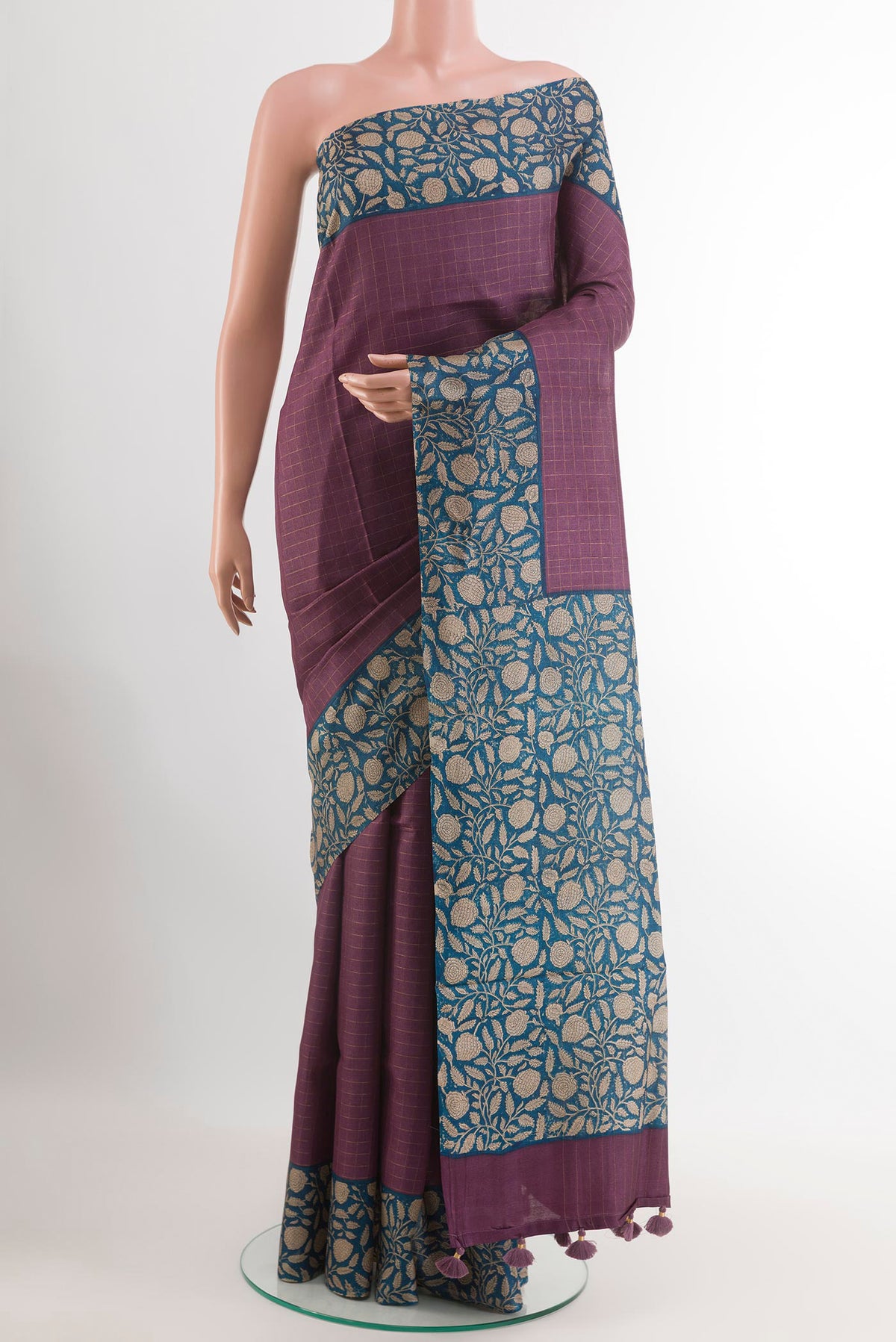Purple Tussar Saree with Checked design on the body and Printed Border.  displayed on a mannequin
