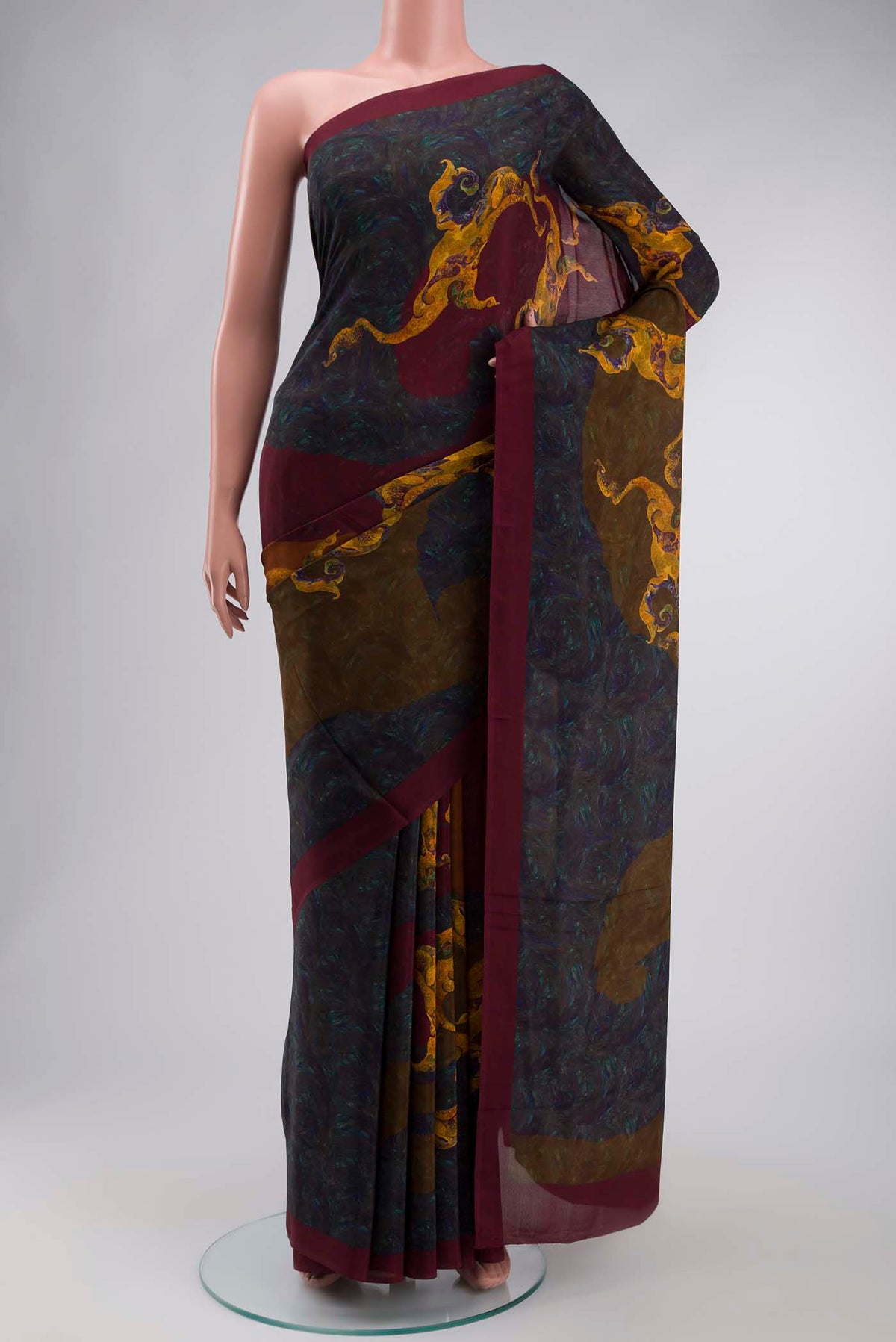 Multi Color Mysore Crepe Saree with Printed design on the body and Printed Border displayed on a mannequin