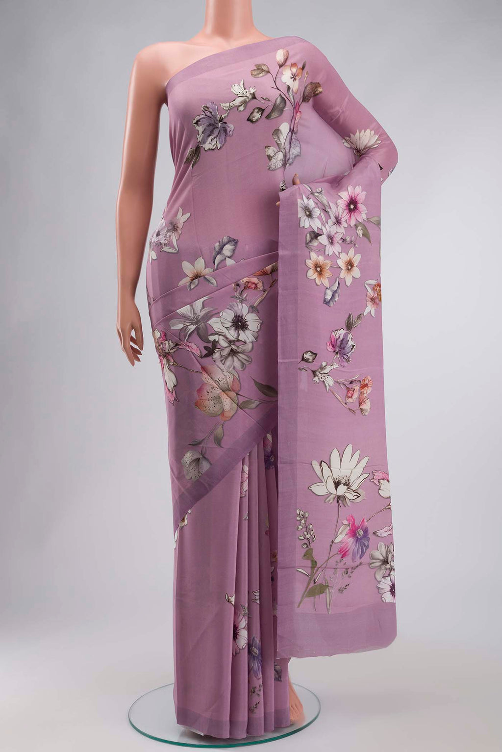 Lavender Mysore Crepe Saree with Printed design on the body and Plain Border displayed on a mannequin