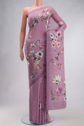 Lavender Mysore Crepe Saree with Printed design on the body and Plain Border displayed on a mannequin