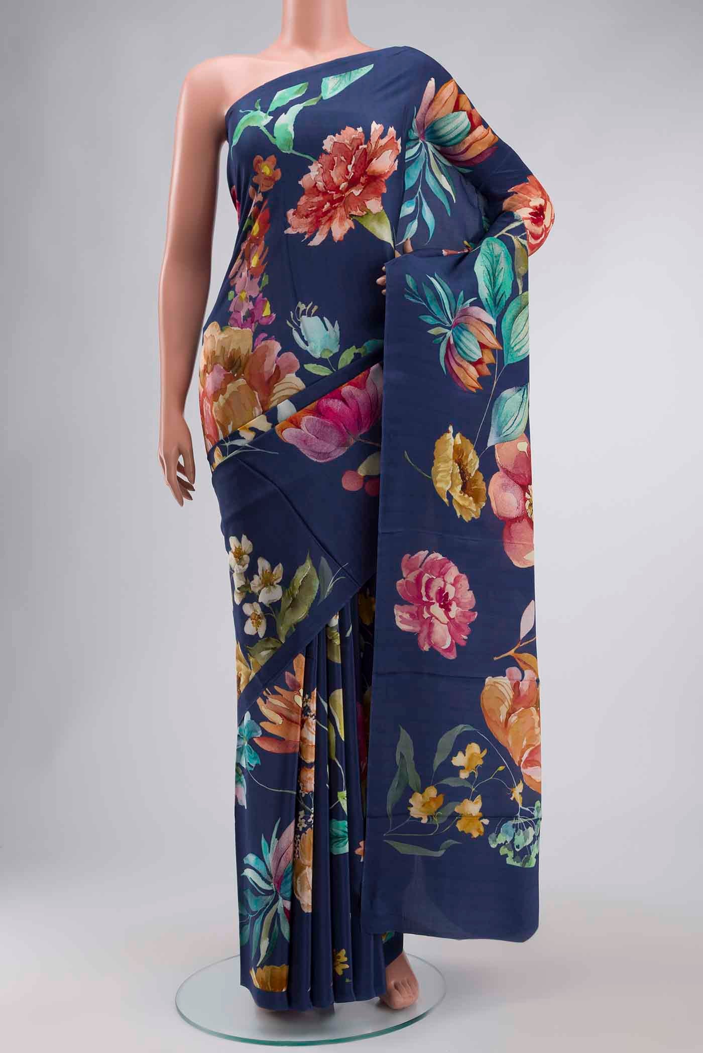 Blue Mysore Crepe Saree with Printed design on the body and Plain Border displayed on a mannequin