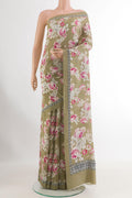 Beige Crepe Saree with Printed design on the body and Printed Border.  displayed on a mannequin