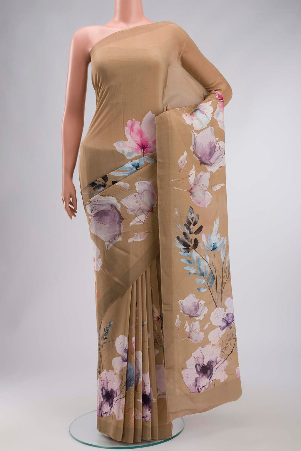Dark Beige Mysore Crepe Saree with Printed design on the body and Plain Border displayed on a mannequin