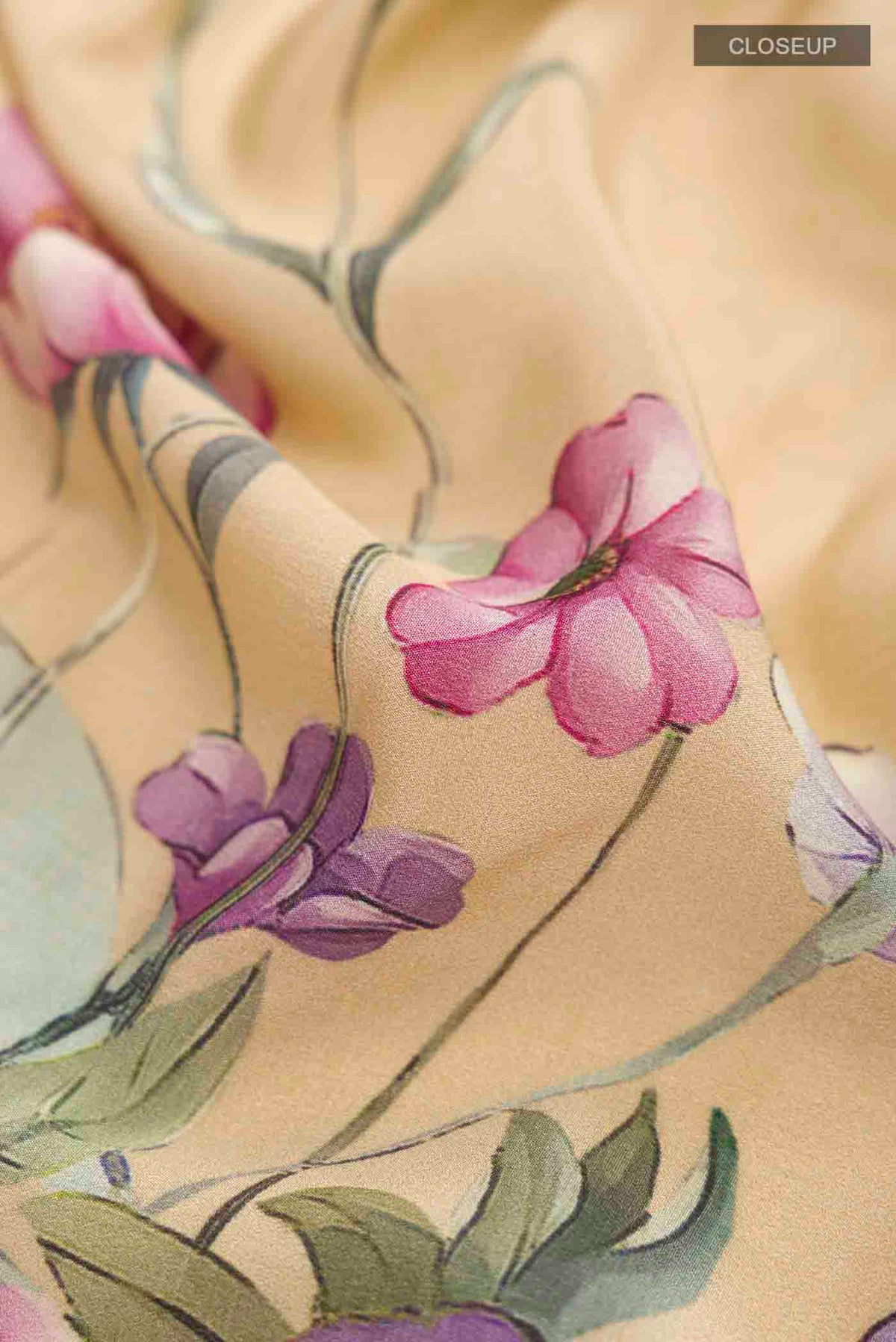 Close up of Beige Mysore Crepe Saree with Printed design on the body and Plain Border displaying folds