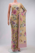Beige Mysore Crepe Saree with Printed design on the body and Plain Border displayed on a mannequin