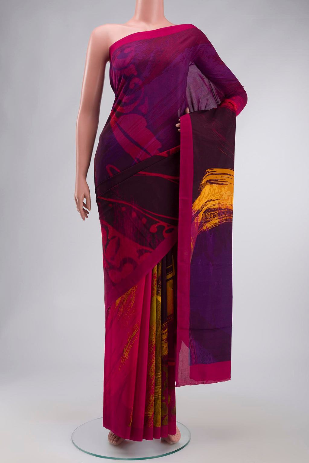 Red Mysore Crepe Saree with Printed design on the body and Printed Border displayed on a mannequin