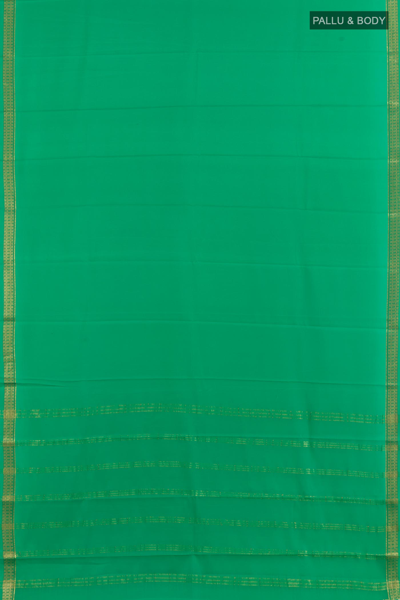 Flat view of Green Mysore Crepe Saree with Plain Body and Zari Border. 