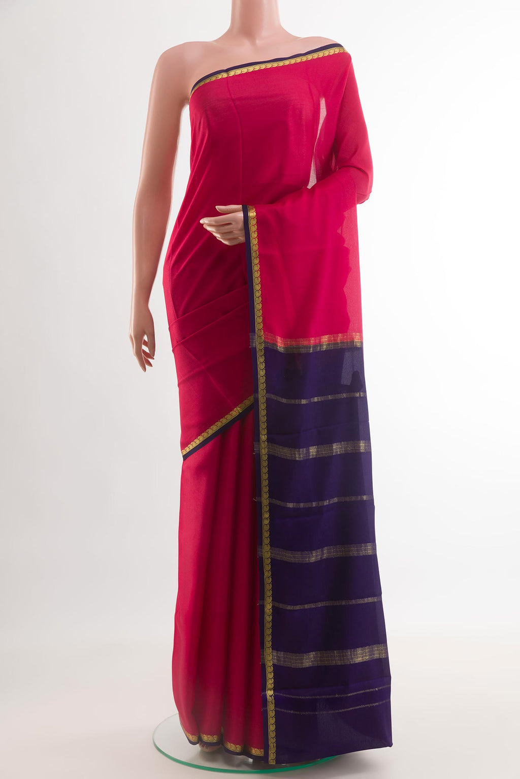 Pink Mysore Crepe Saree with Plain Body and Zari Border.  displayed on a mannequin