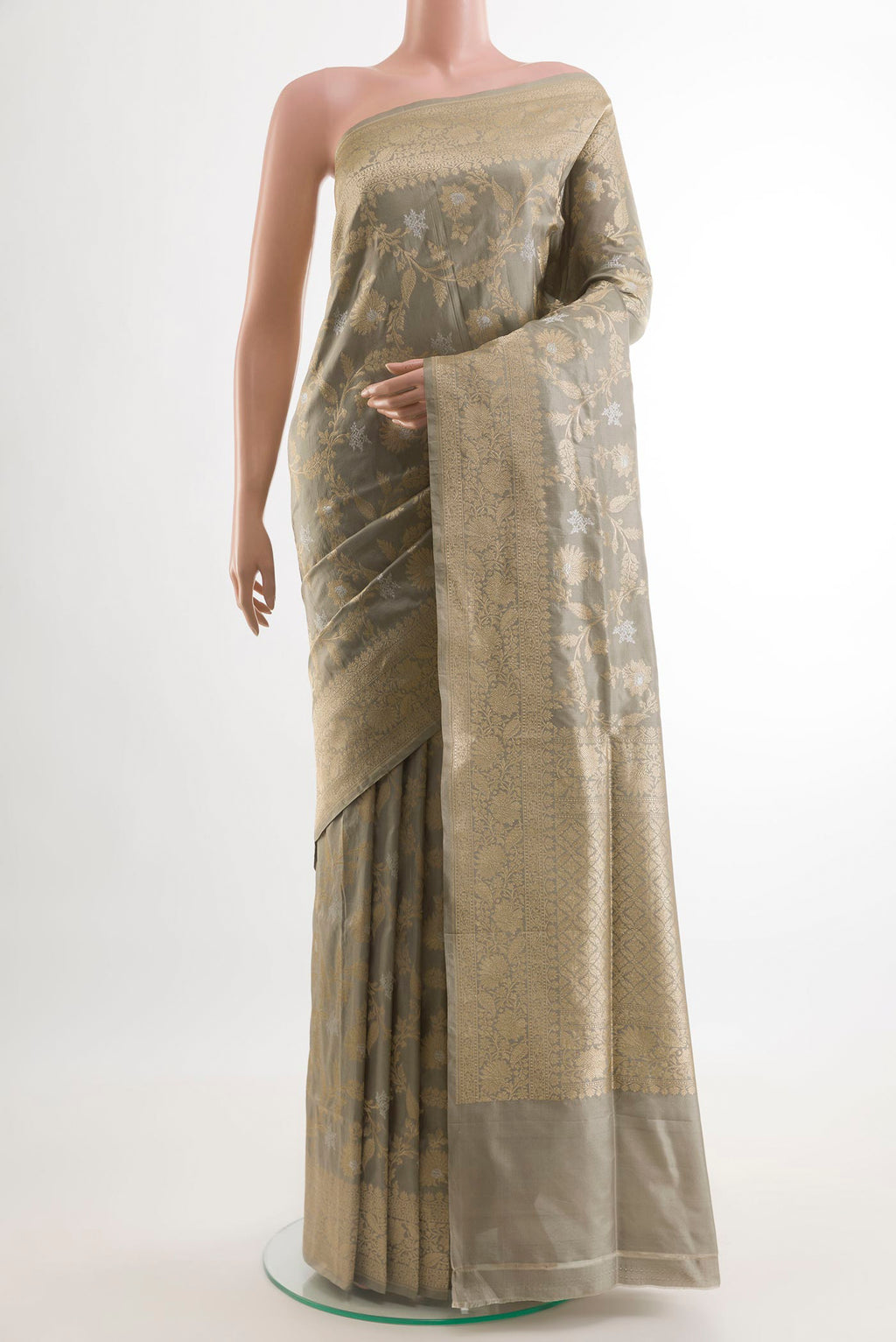 Grey Banarasi Silk Saree with Zari Brocade on the body and Zari Border.  displayed on a mannequin