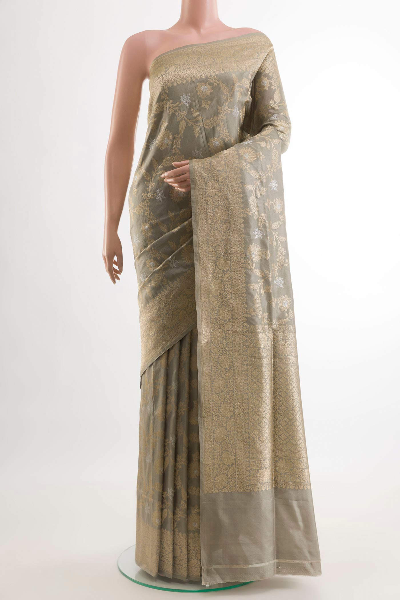 Grey Banarasi Silk Saree with Zari Brocade on the body and Zari Border.  displayed on a mannequin