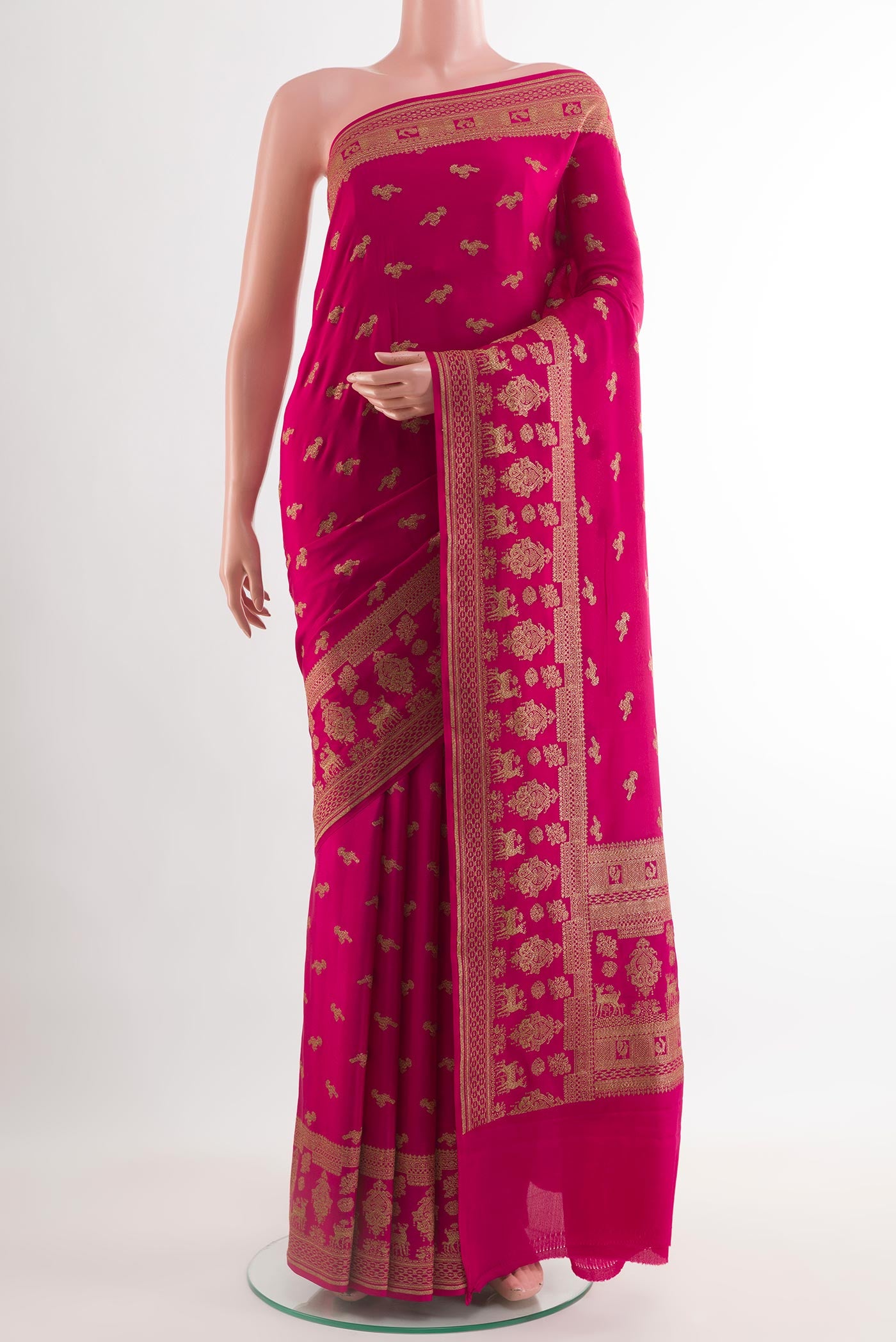 Dark Pink Mysore Crepe Saree with Zari Butta on the body and Zari Border.  displayed on a mannequin