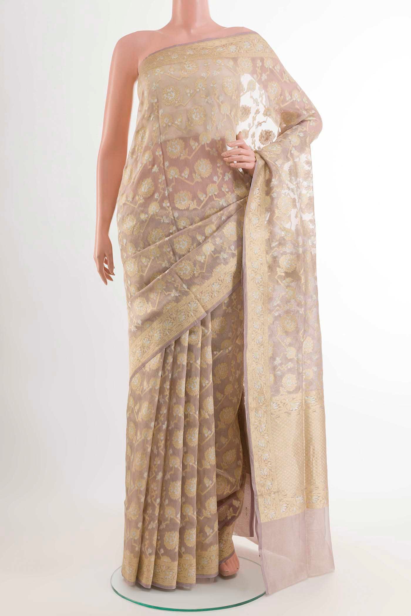 Lavender Banarasi Kora Silk Saree with Zari Brocade on the body and Zari Border displayed on a mannequin