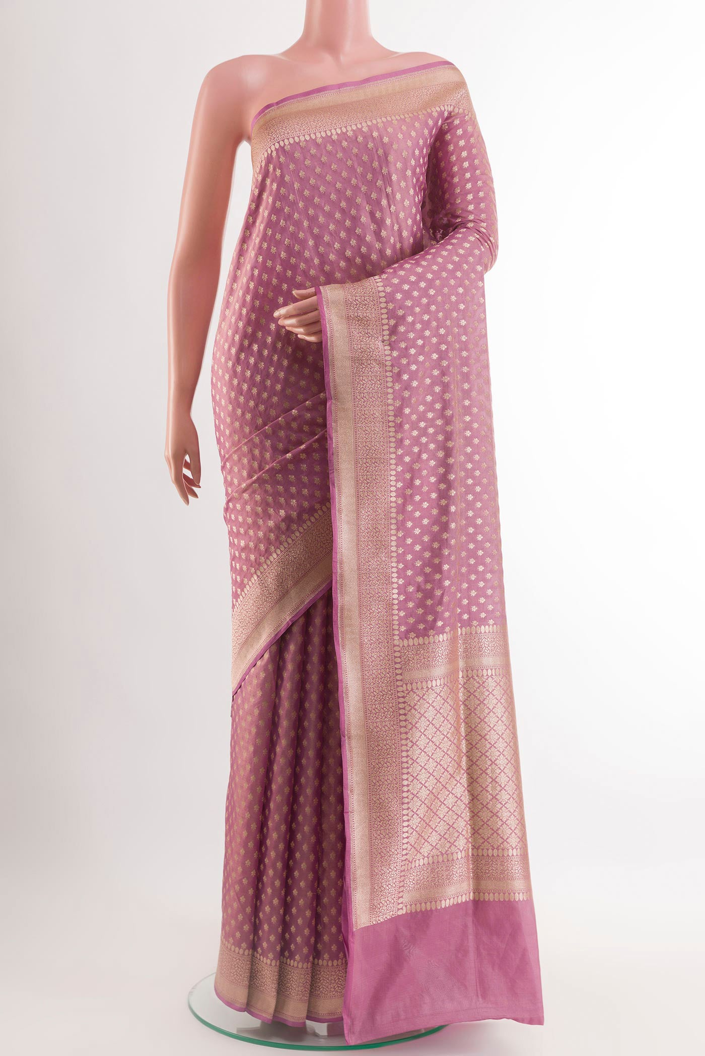 Lavender Banarasi Silk Saree with Zari Butta on the body and Zari Border.  displayed on a mannequin