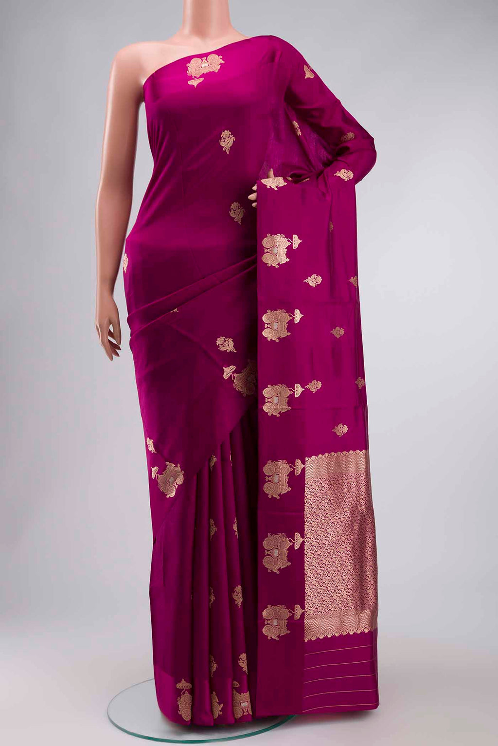 Purple Banarasi Katan Silk Saree with Zari Butta on the body and Zari Border displayed on a mannequin
