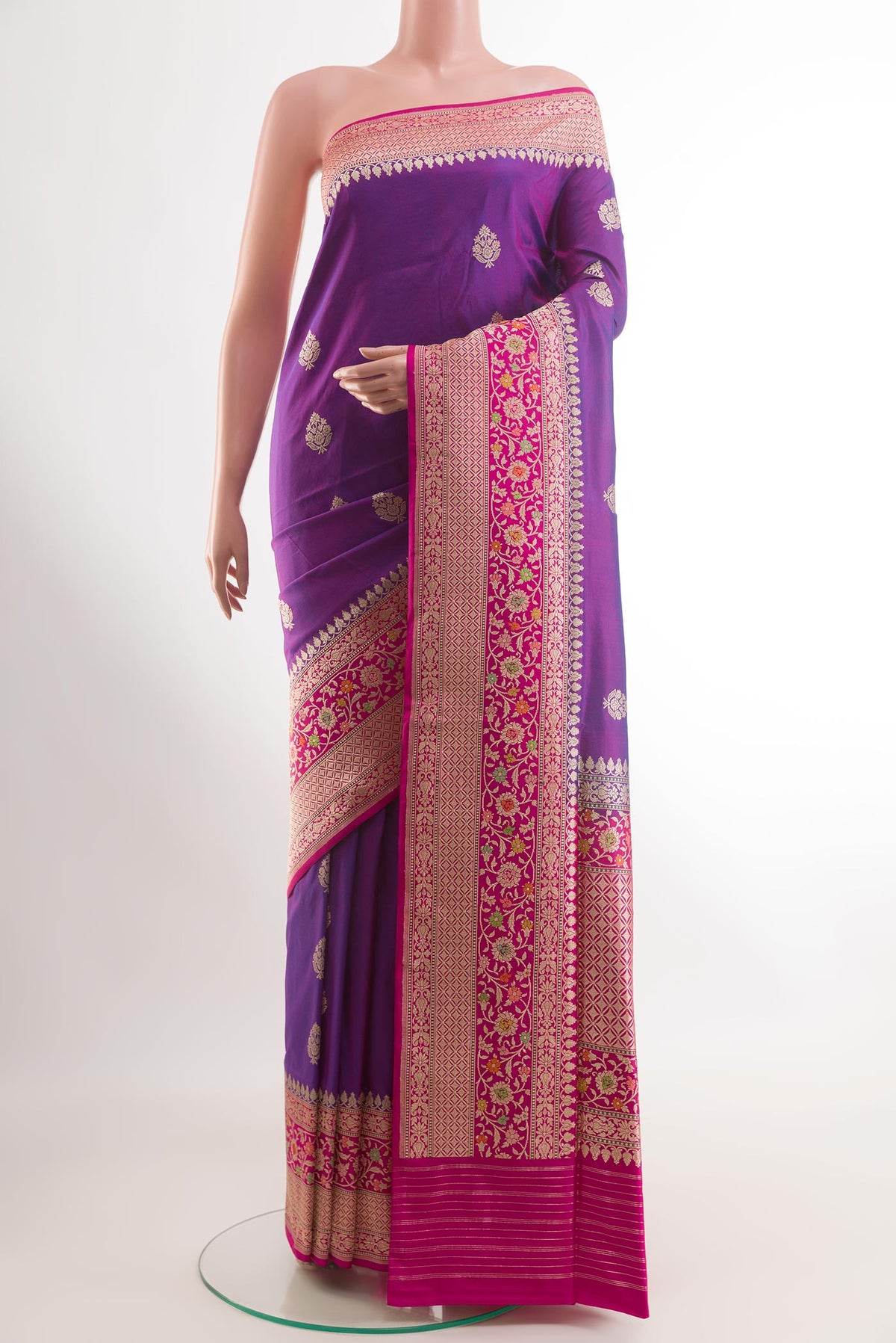 Purple Banarasi Silk Saree with Zari Butta on the body and Zari Border.  displayed on a mannequin