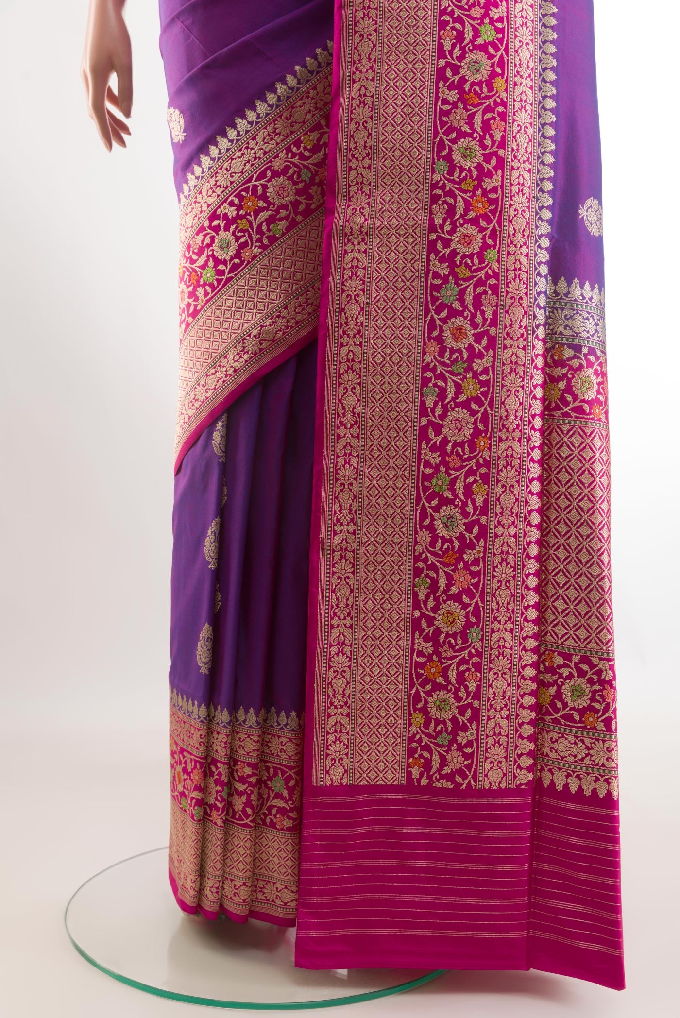 Pleats and pallu of Purple Banarasi Silk Saree with Zari Butta on the body and Zari Border. 