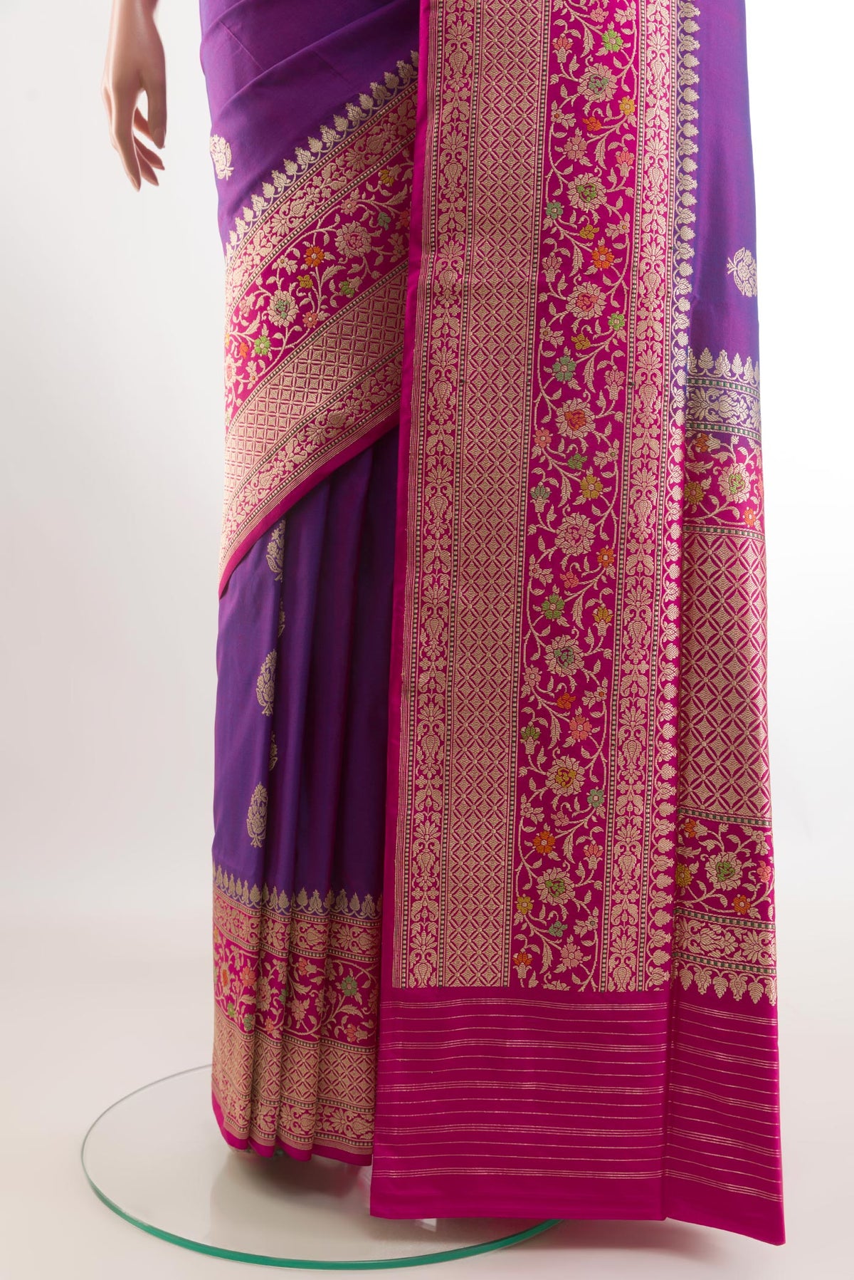 Pleats and pallu of Purple Banarasi Silk Saree with Zari Butta on the body and Zari Border. 