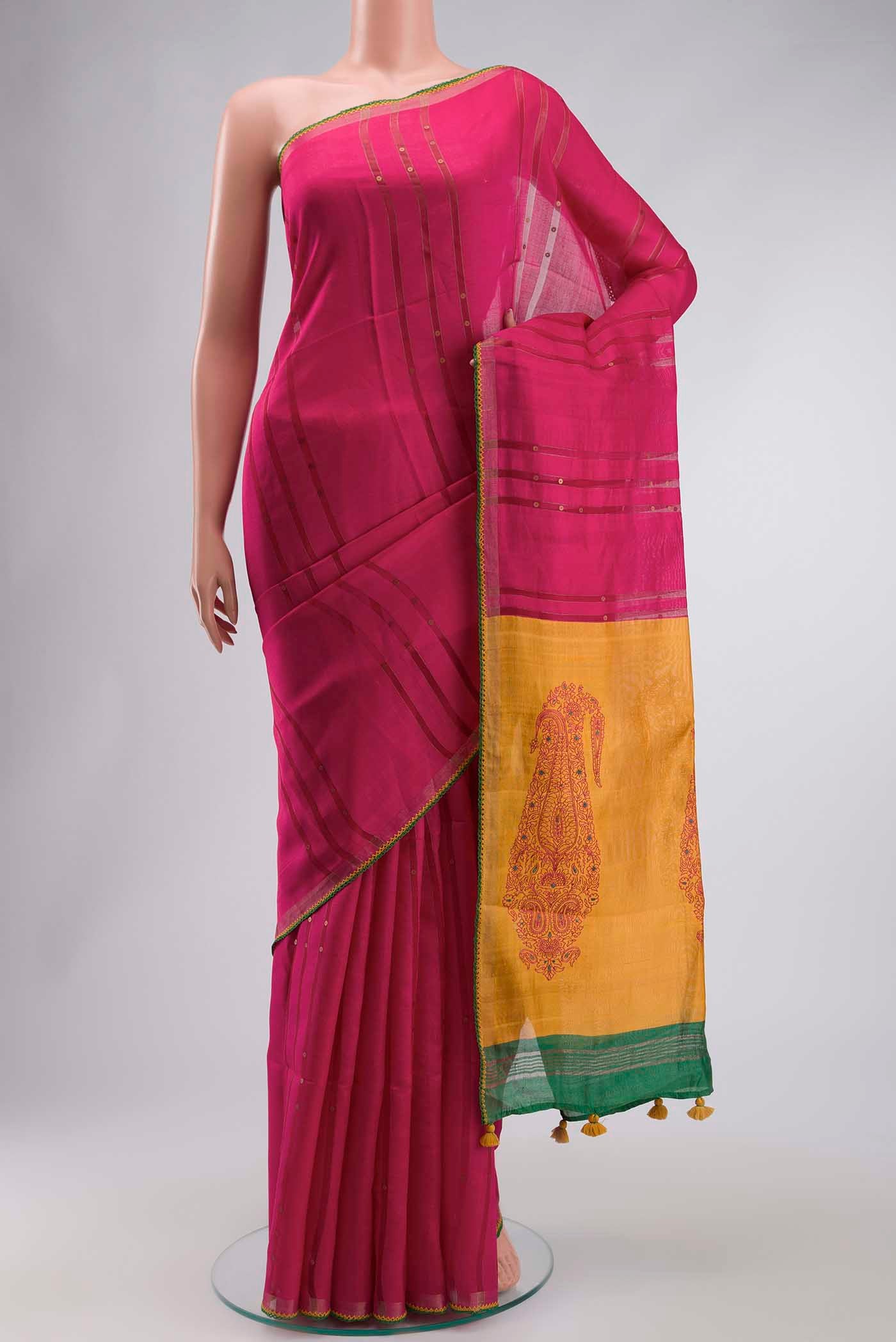 Pink Tussar Silk Saree with Stripes on the body and Embroidery Border displayed on a mannequin