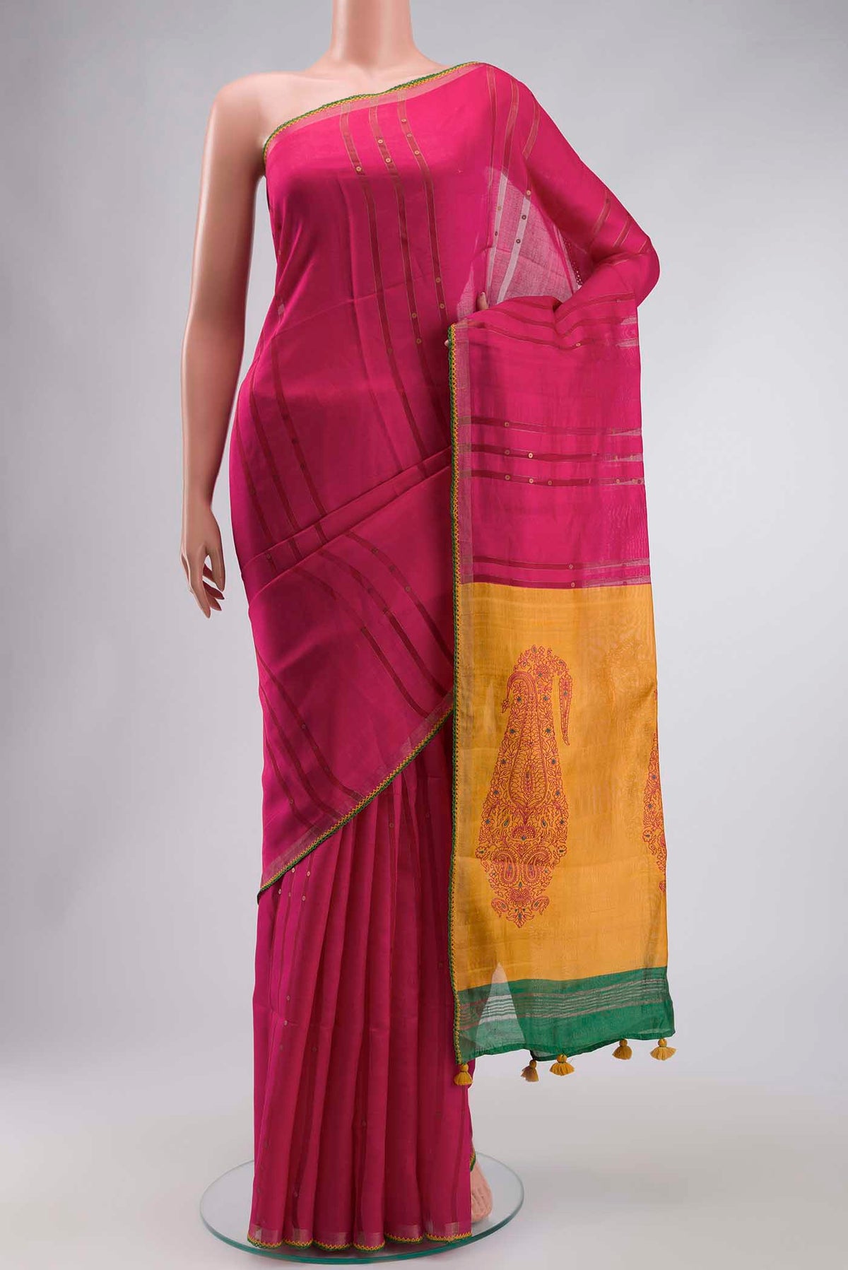 Pink Tussar Silk Saree with Stripes on the body and Embroidery Border displayed on a mannequin