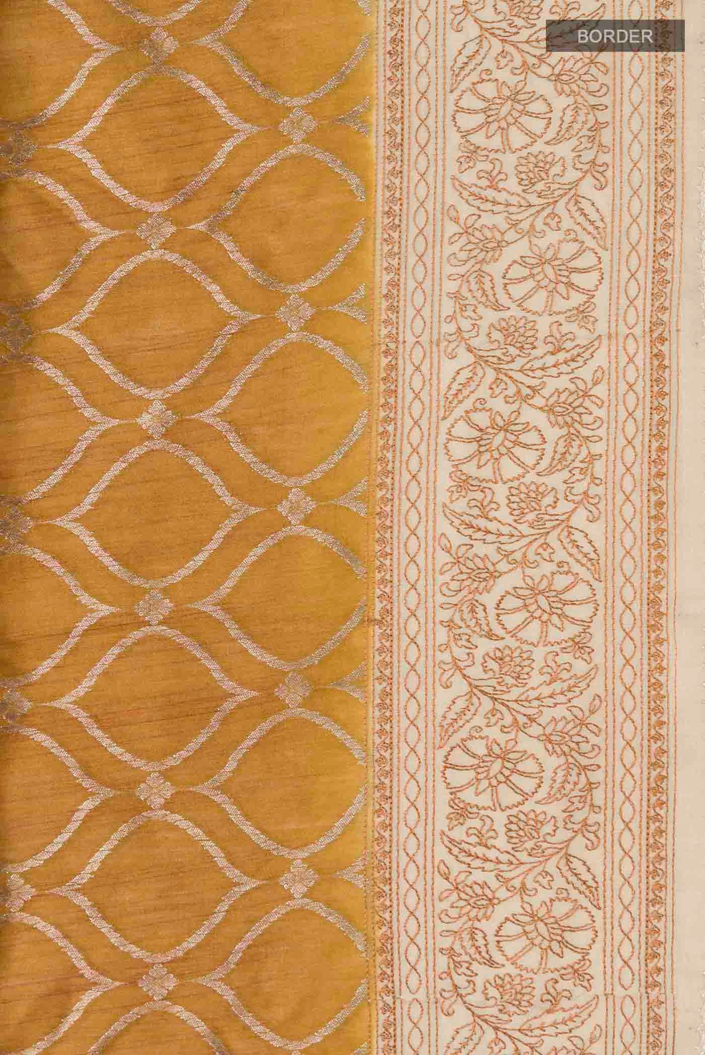 Border image of Mustard Tussar Silk Saree with Zari Butta on the body and Embroidery Border