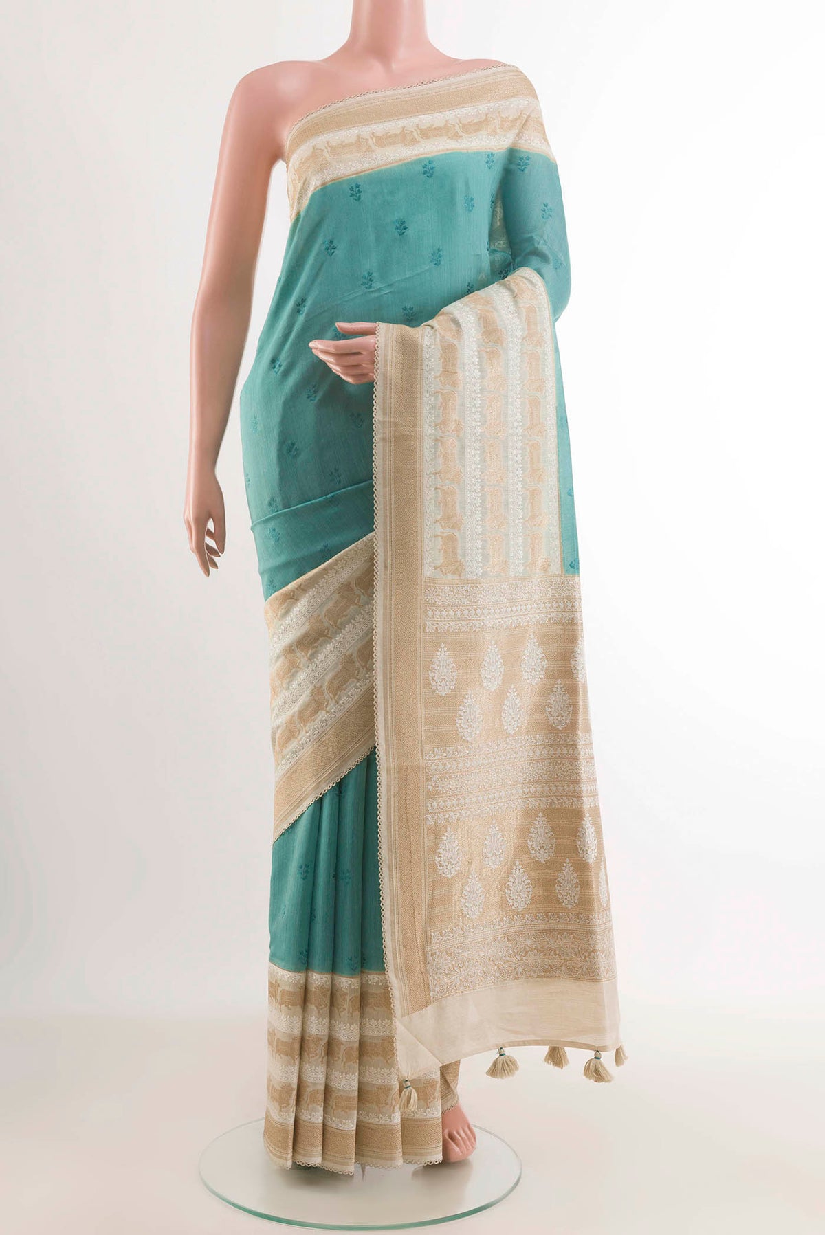 Blue Tussar Saree with Thread Butta on the body and Thread Border displayed on a mannequin