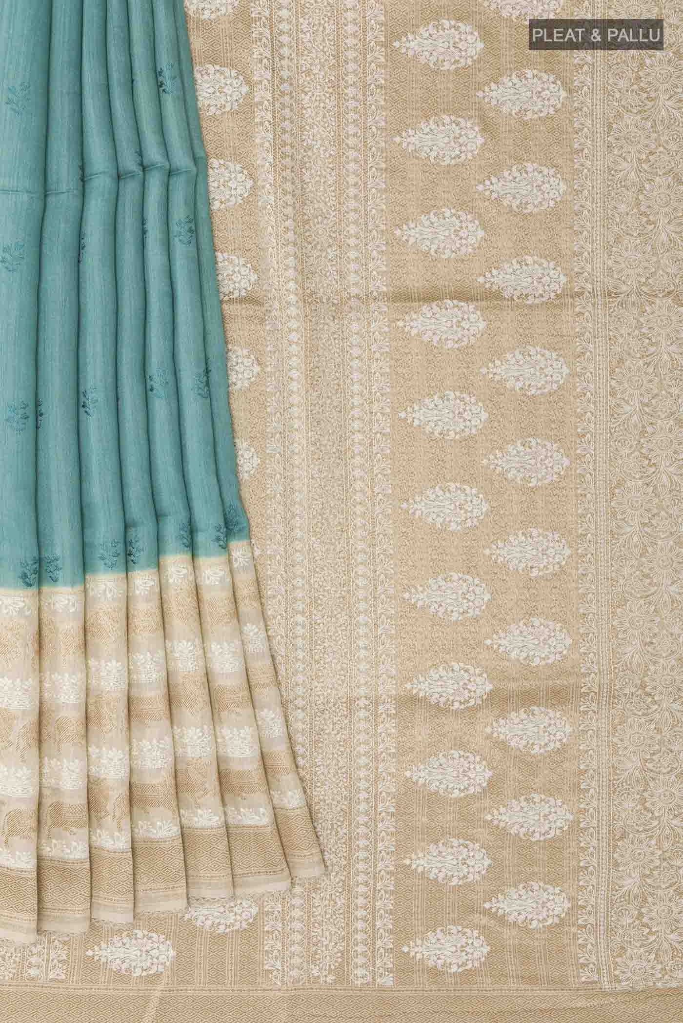 Pleats and pallu of Blue Tussar Saree with Thread Butta on the body and Thread Border