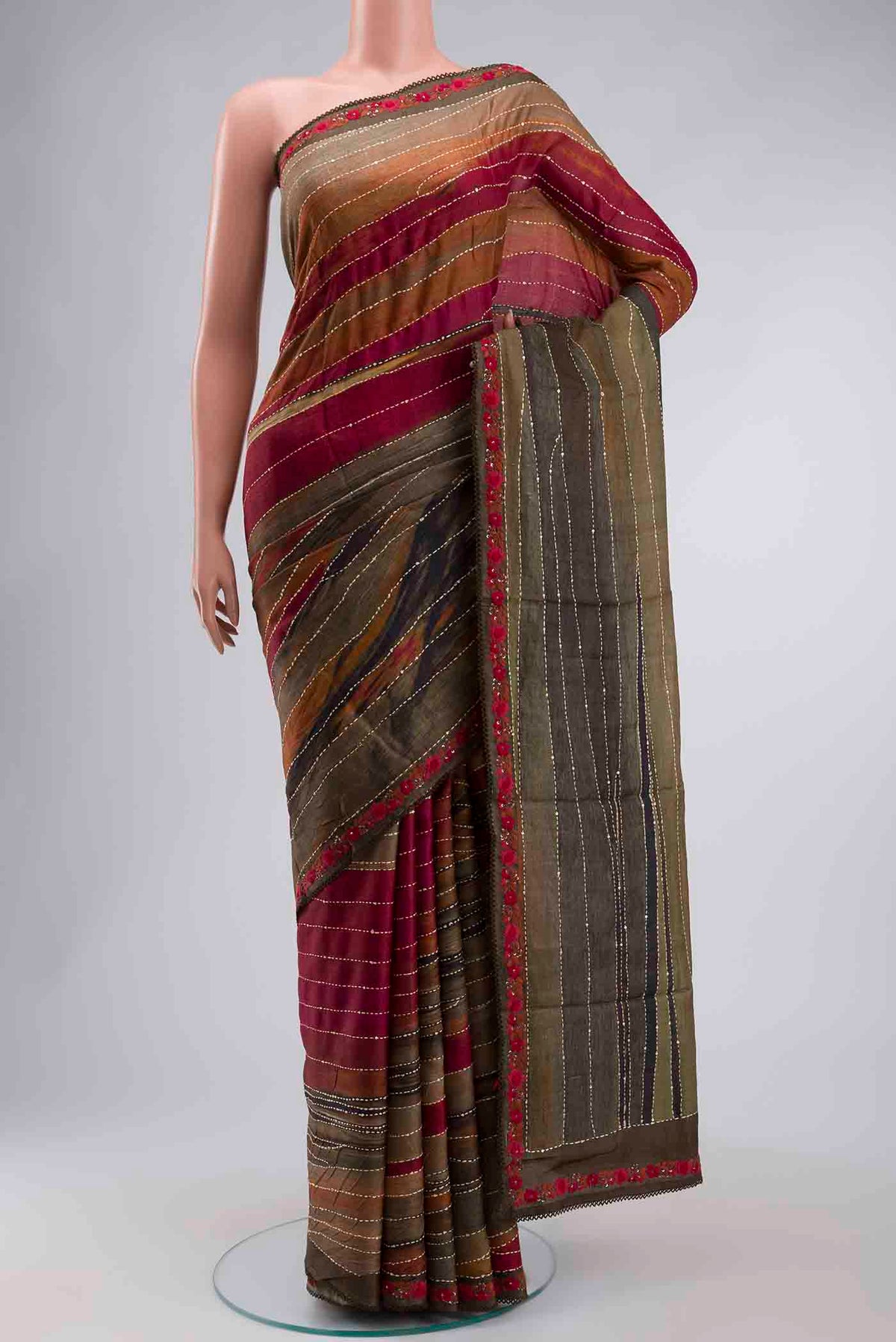 Multi Color Tussar Silk Saree with Embroidery on the body and Embroidery Border displayed on a mannequin