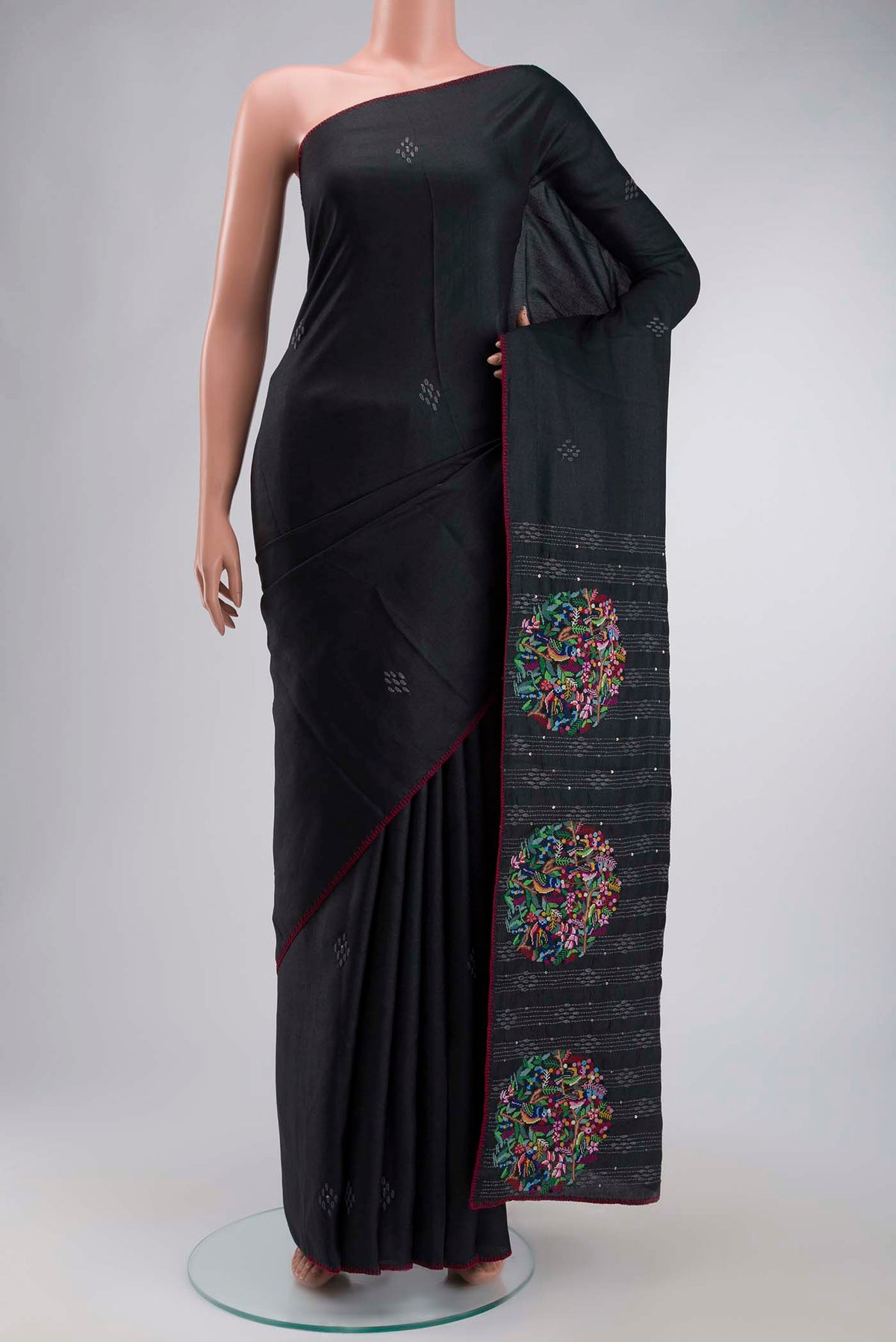 Black Tussar Silk Saree with Plain Body and Embroidery Border displayed on a mannequin