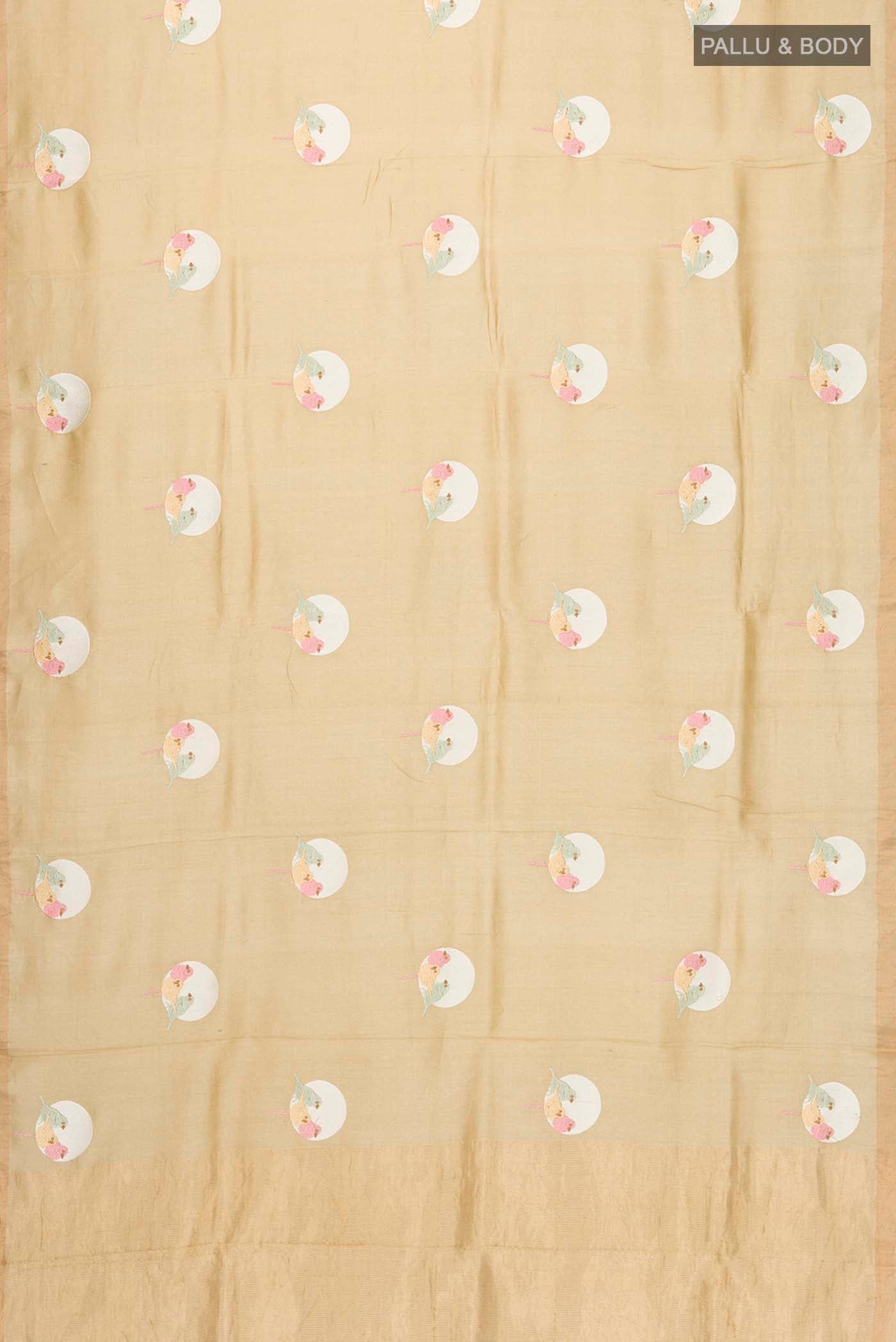 Flat view of Beige Tussar Silk Saree with Embroidery on the body and Zari Border