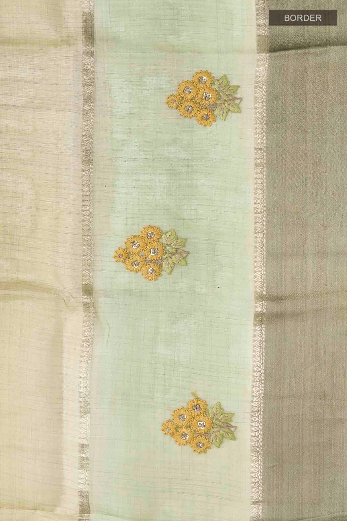Border image of Green Tussar Silk Saree with Stripes on the body and Satin Border