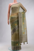Green Tussar Silk Saree with Stripes on the body and Satin Border displayed on a mannequin
