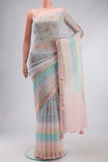 Light Blue Linen Cotton Saree with Printed design on the body and Zari Border displayed on a mannequin