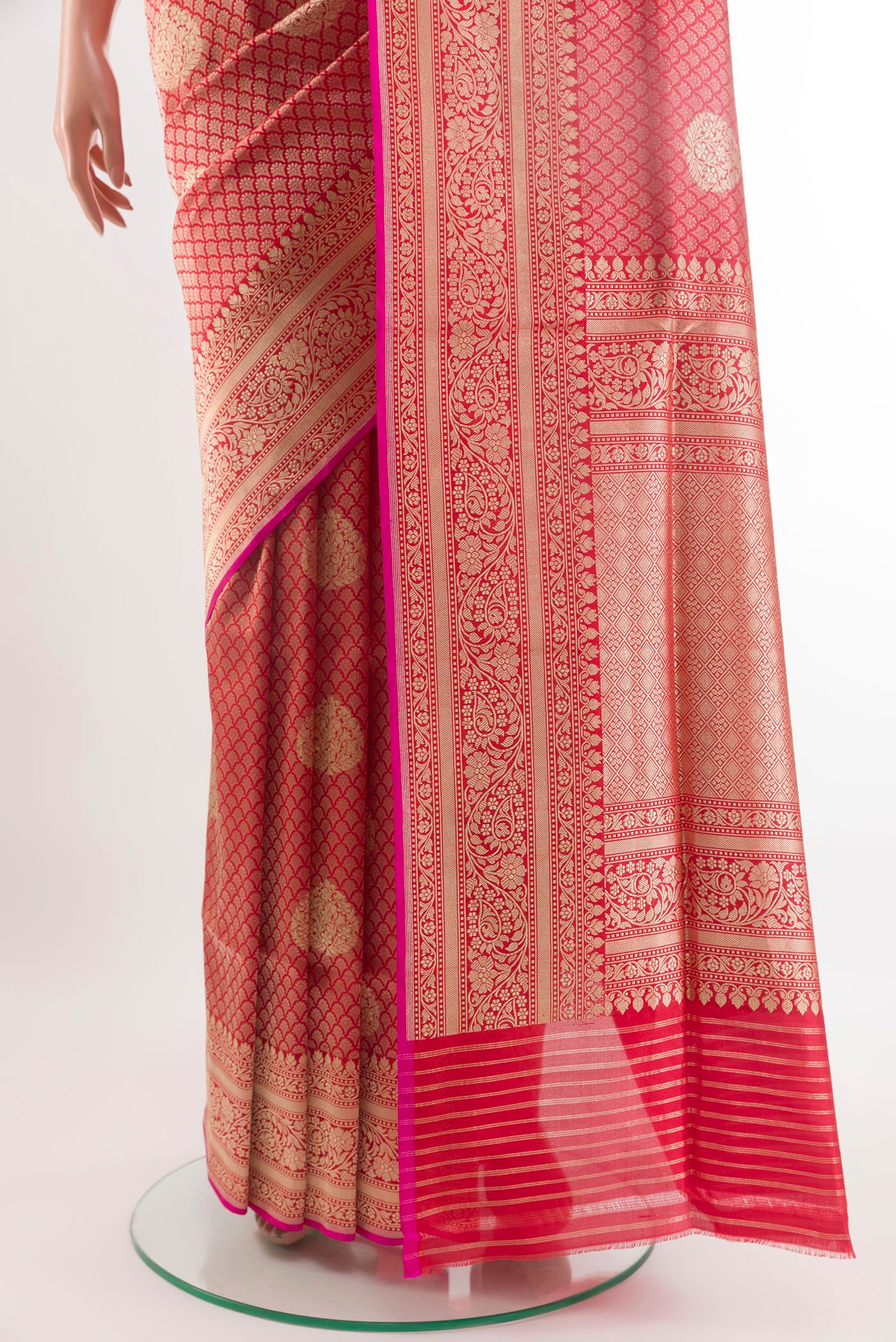 Pleats and pallu of Red Banarasi Silk Saree with Zari Brocade on the body and Zari Border. 