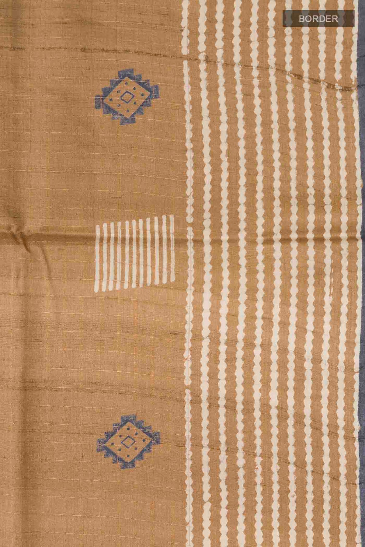 Border image of Brown Tussar Silk Saree with Checked design on the body and Plain Border
