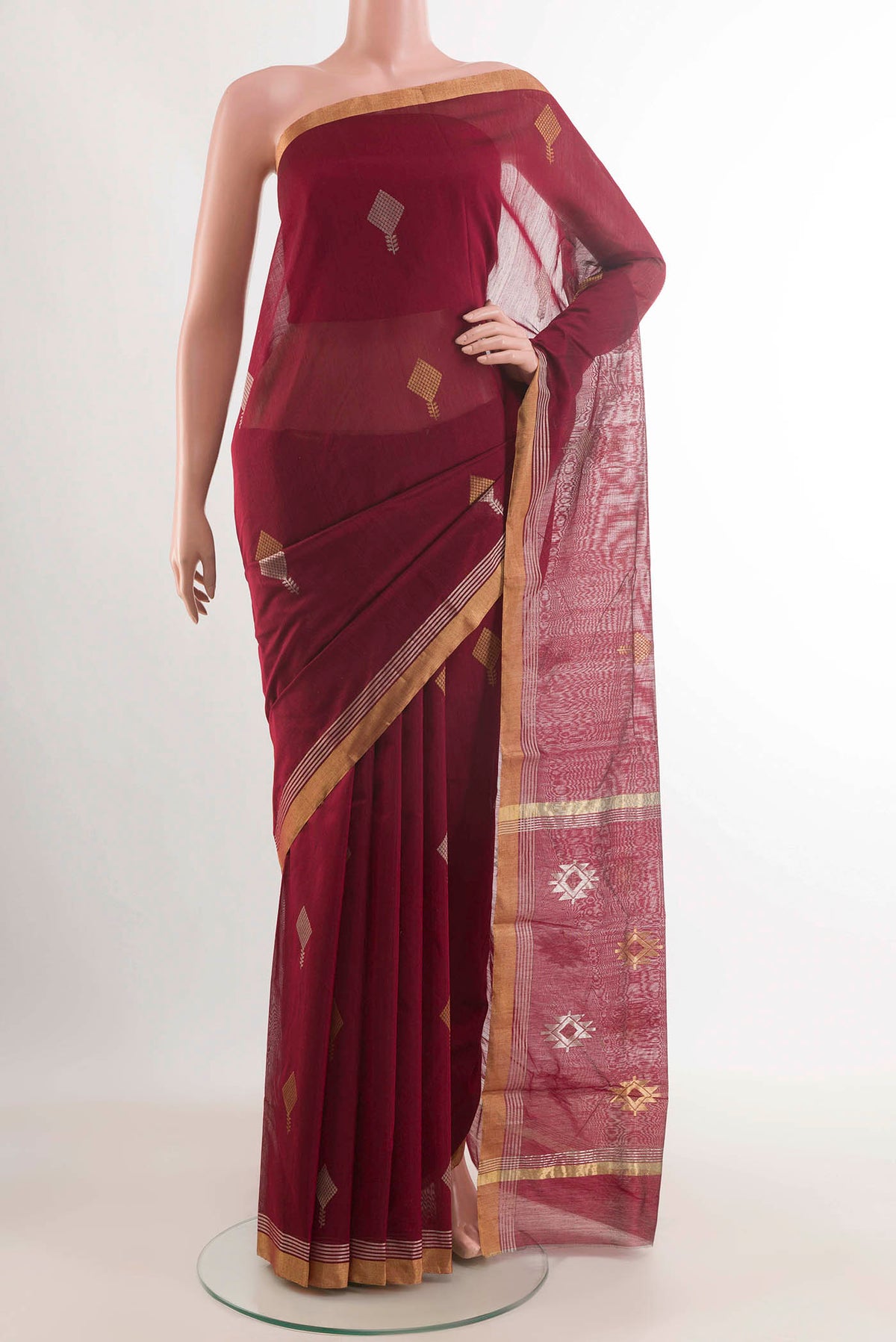 Maroon Chanderi Silk Cotton Saree with Zari Butta on the body and Zari Border displayed on a mannequin