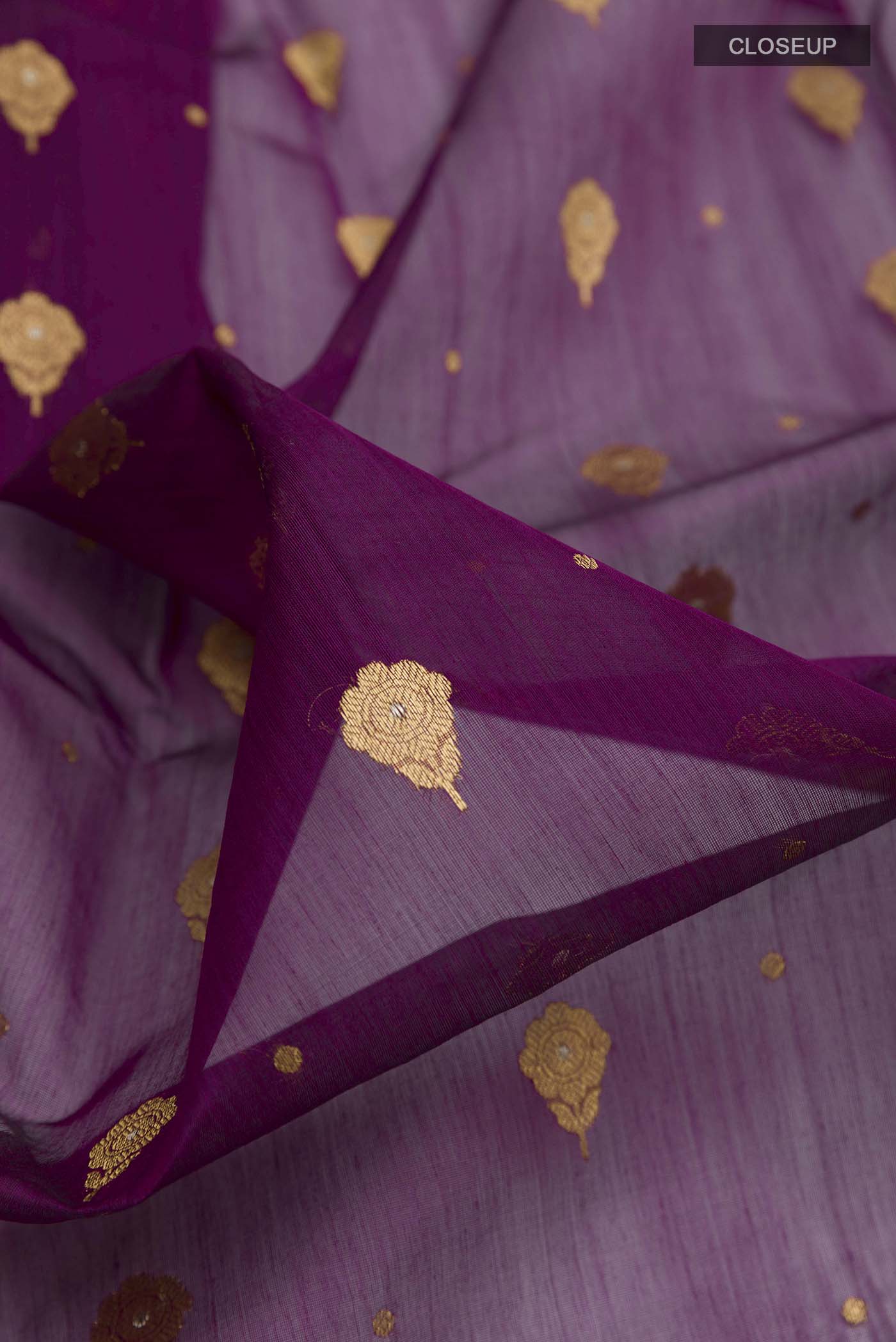 Close up of Purple Chanderi Silk Saree with Zari Butta on the body and Zari Border displaying folds