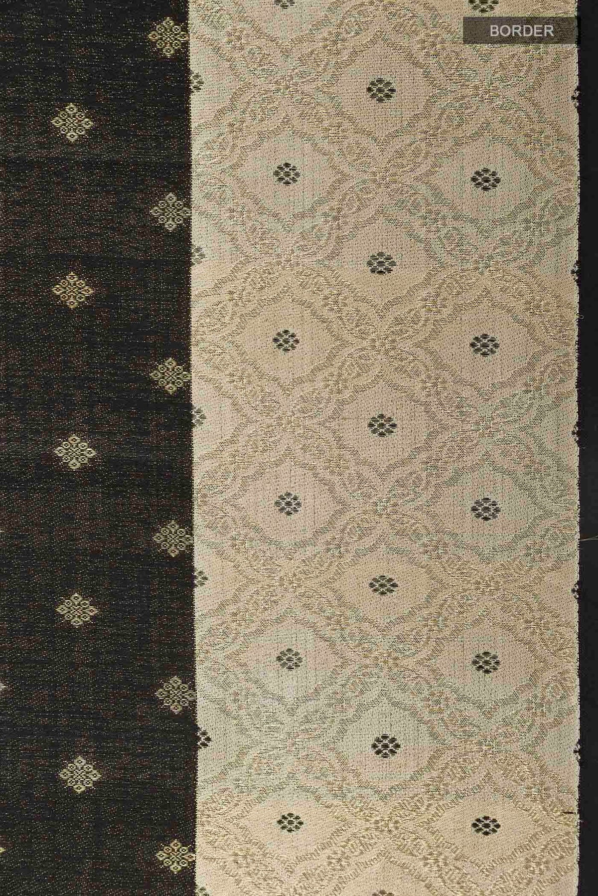 Border image of Black Kanchipuram Silk Saree with Zari Butta on the body and Zari Border