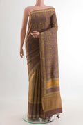Multi Color Tussar Silk Saree with Printed design on the body and Printed Border.  displayed on a mannequin